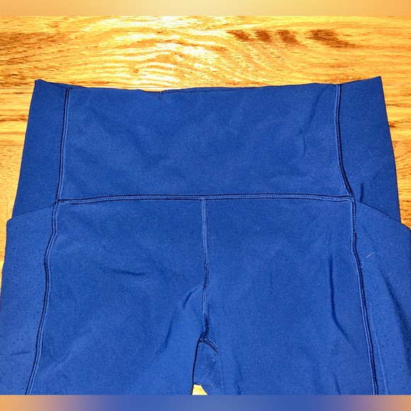 Lululemon navy leggings w/ laser cut design down sides - Picture 6 of 10
